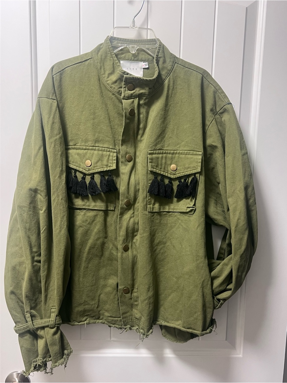 LUSH olive green utility shirt jacket featuring black tassel fringe details